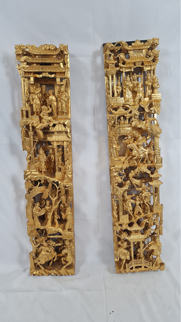 Paire de sculpture murale bois doré